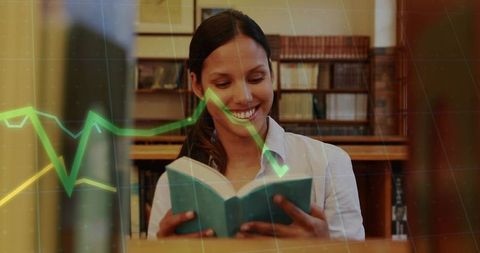 Hispanic woman reading book in library with green data graph overlay suggesting research