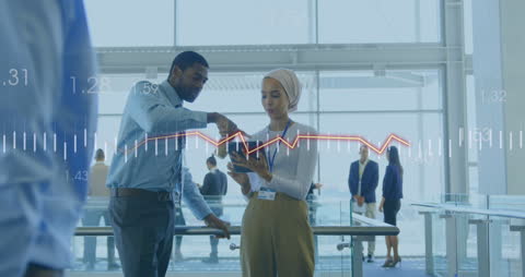 Diverse Business Professionals Analyzing Financial Data Together