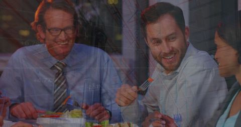 Businesspeople Enjoying Lunch with Data Overlay
