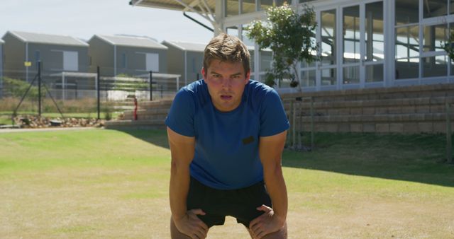 Male Athlete Pausing for Breath During Outdoor Workout - Download Free Stock Images Pikwizard.com