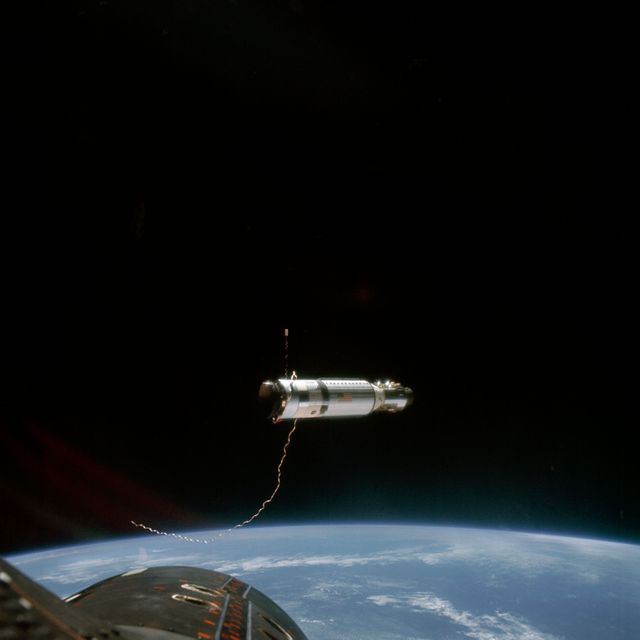 S66-54585 (12-15 Sept. 1966) --- The Agena Target Docking Vehicle at a distance of approximately 80 feet from the Gemini-11 spacecraft. This view was taken after the disconnect of the tether between the two vehicles. Crew members for the Gemini-11 mission are astronauts Charles Conrad Jr., command pilot, and Richard F. Gordon Jr., pilot. Photo credit: NASA