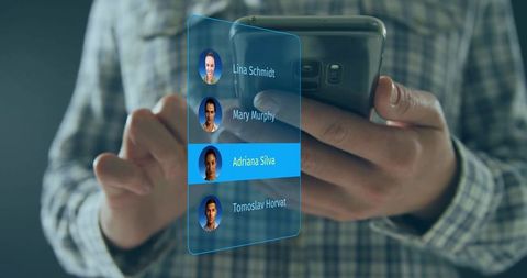 Man Interacting with Holographic AR Contacts List on Smartphone for Futuristic Communication