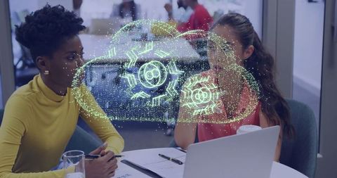 Women in Modern Office with Futuristic Cloud Hologram Interface