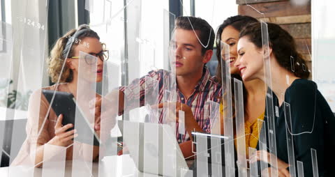 Diverse Team Analyzing Financial Data Interface Collaboration