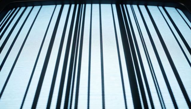 Backlit vertical stripes creating minimalist abstract texture with rounded bezel