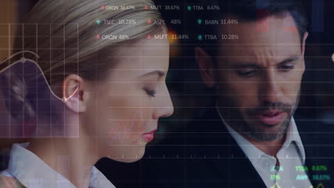 Professionals Analyzing Financial Graphs in Modern Environment