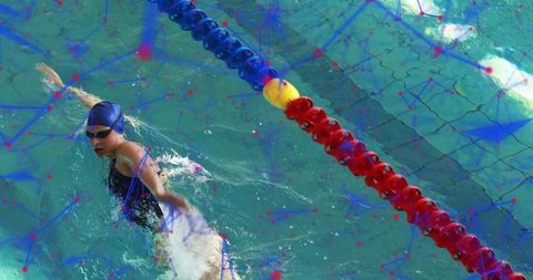 Competitive Swimmer in Lane Moving Fast in Uniform