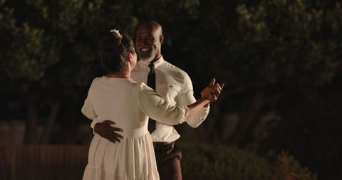Joyful Night Dance Celebrating Love in Garden