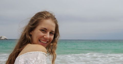 Smiling Woman Enjoying Beach Landscape - Download Free Stock Images Pikwizard.com