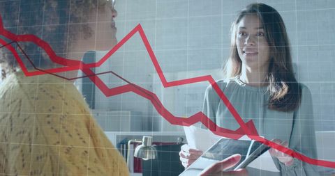 Diverse Female Colleagues Discussing Business at Casual Office