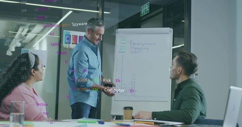 Corporate Team Analyzing Graph Data in Modern Conference Room