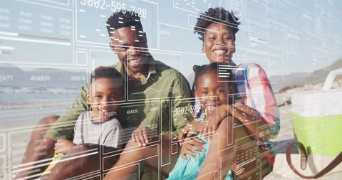 Smiling family enjoying beach time with modern technology overlay