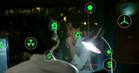 Contemplative Professional Examining Futuristic Energy Solutions