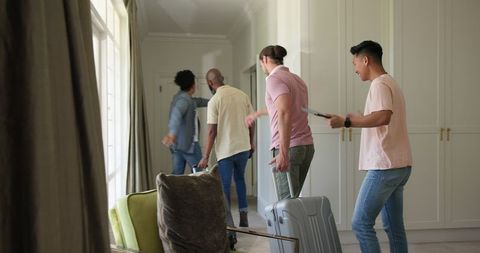 Group of Friends Preparing for Special Celebration Together