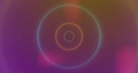 Glowing neon circles on vivid gradient background
