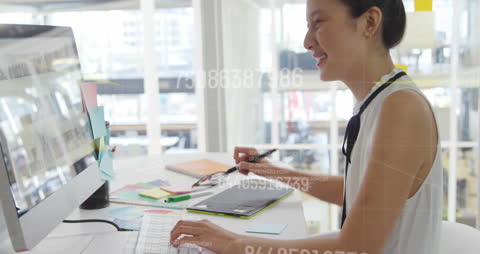 Businesswoman Working with Data Overlays in Modern Office
