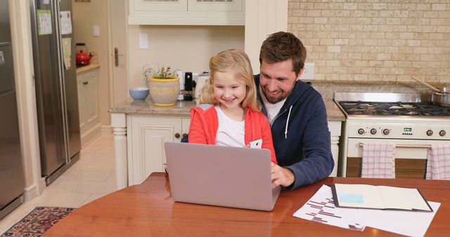 Father and Daughter Learning Together at the Kitchen Table - Download Free Stock Images Pikwizard.com