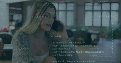 Woman Talking on Smartphone with Code Overlay Display