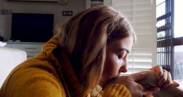 Woman Showing Affection to Her Pet Dog at Home - Download Free Stock Images Pikwizard.com