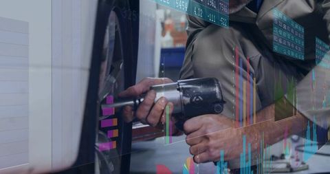 Automotive Technician Tightening Wheel Lug Nut with Impact Wrench and Digital Data Overlay