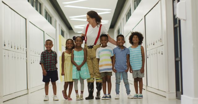 Female Firefighter Connecting With Young Children in School Hallway - Download Free Stock Images Pikwizard.com