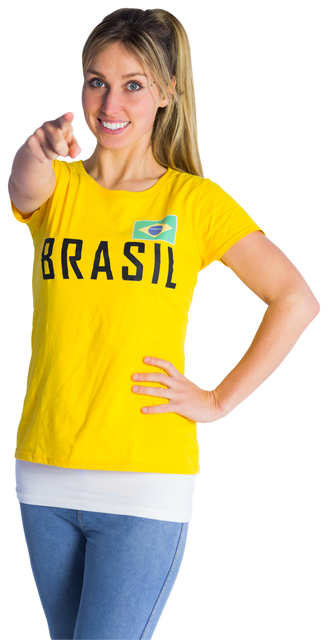 Cheerful Football Fan in Transparent Brasil T-Shirt Pointing Forward - Download Free Stock Videos Pikwizard.com