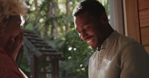 Friends Sharing Warm Moment in Tranquil Home Environment