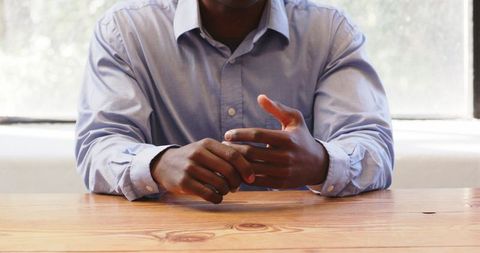 Business Professional Gesturing During Office Meeting - Download Free Stock Images Pikwizard.com