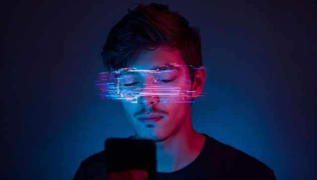 Young man engulfed by futuristic digital glitch virtual reality