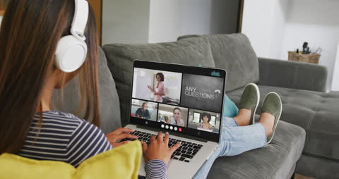 Student Engaged in Virtual Learning via Laptop Video Conference