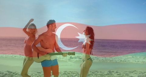 Friends enjoying beach with musical vibes and azerbaijani spirit