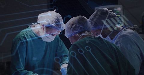 Surgeons Operating in High-Tech OR with Data Overlay