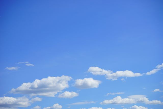 Bright Blue Sky with Fluffy White Clouds on Sunny Day - Download Free Stock Photos Pikwizard.com