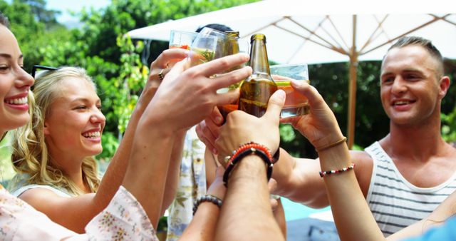 Joyful Friends Toasting at Outdoor Summer BBQ by Poolside - Download Free Stock Images Pikwizard.com