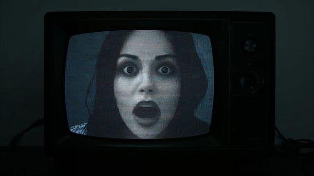 Horror Scene on Vintage CRT TV Screen with Eerie Static Effect