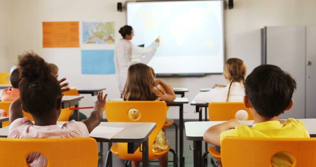 Teacher Conducting Geography Lesson in Classroom with Attentive Students - Download Free Stock Images Pikwizard.com