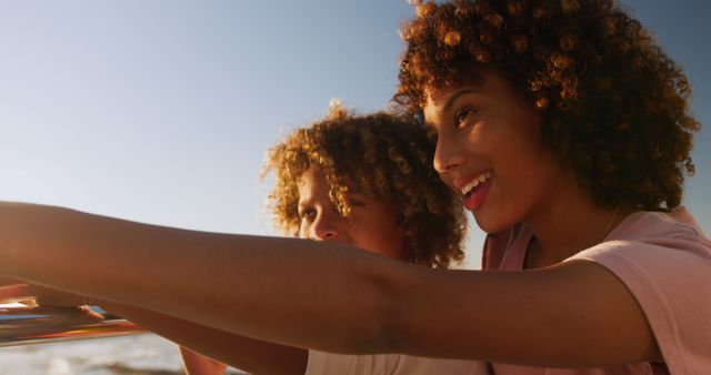 Mother and Child Enjoying Scenic Ocean View at Sunset - Download Free Stock Images Pikwizard.com