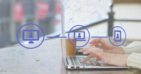 Person Typing on Laptop with Digital Network Overlay