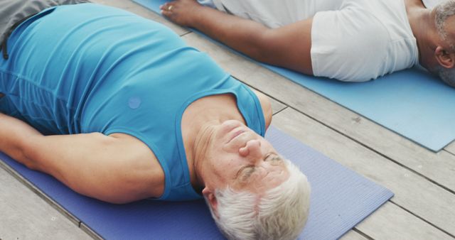 Senior Men Practicing Relaxation Technique on Yoga Mats - Download Free Stock Images Pikwizard.com