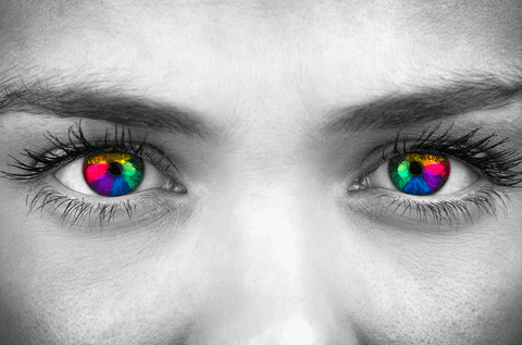 colorful psychedelic eyes on monochrome female face - Download Free Stock Videos Pikwizard.com