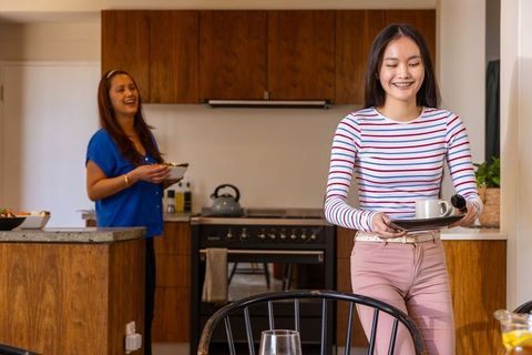 Asian Family Enjoying Togetherness in Cozy Kitchen