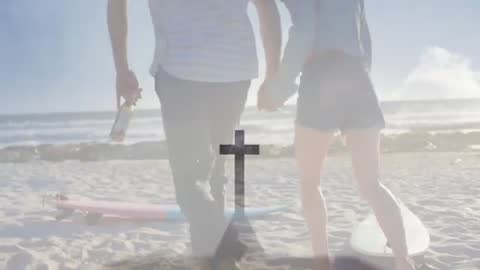 Couple Walking on Beach with Surfboards Enjoying Sunny Day