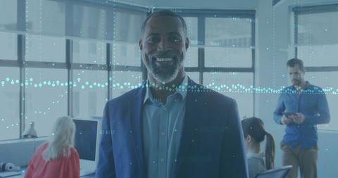 Businessman with Digital Financial Data in Modern Office