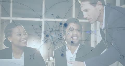 Diverse Business Team Engaged in Network Collaboration and Growth