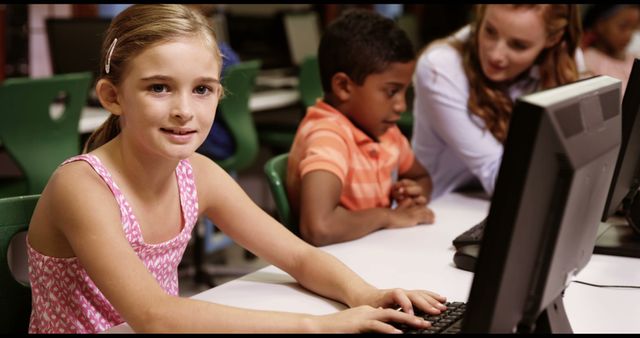 Diverse Kids Learning on Computers in Classroom with Teacher - Download Free Stock Photos Pikwizard.com