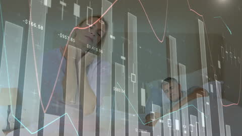 Couple Relaxing as Digital Financial Data Appears Overlaid