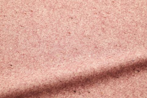 Soft pink heathered wool texture close-up for textile, fashion, interior design