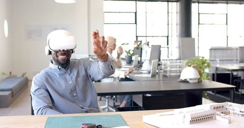 Man Engaging with Virtual Reality in Modern Office Scene