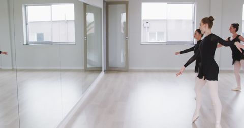 Ballet Dancers Perfecting Moves in Dance Studio with Mirror Reflexion - Download Free Stock Images Pikwizard.com