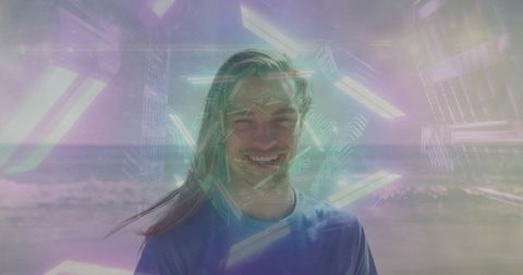 Smiling man at shoreline with pastel neon hexagonal overlays, dreamlike beach portrait